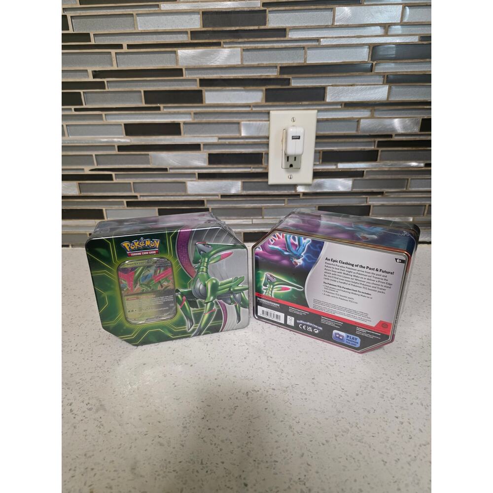 Pokemon Trading Card Games Paradox Clash Iron Leaves Tin - 5 Booster Packs